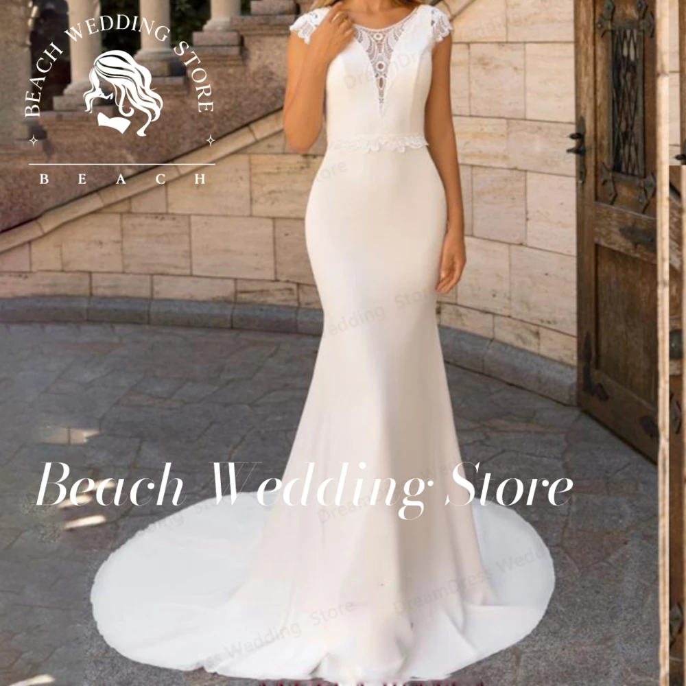 Rücken freie Strand V-Ausschnitt Brautkleider Elfenbein Brautkleid Mütze Ärmel Sweep Zug Robe de Mariee Spitze Fleck elegante Illusion