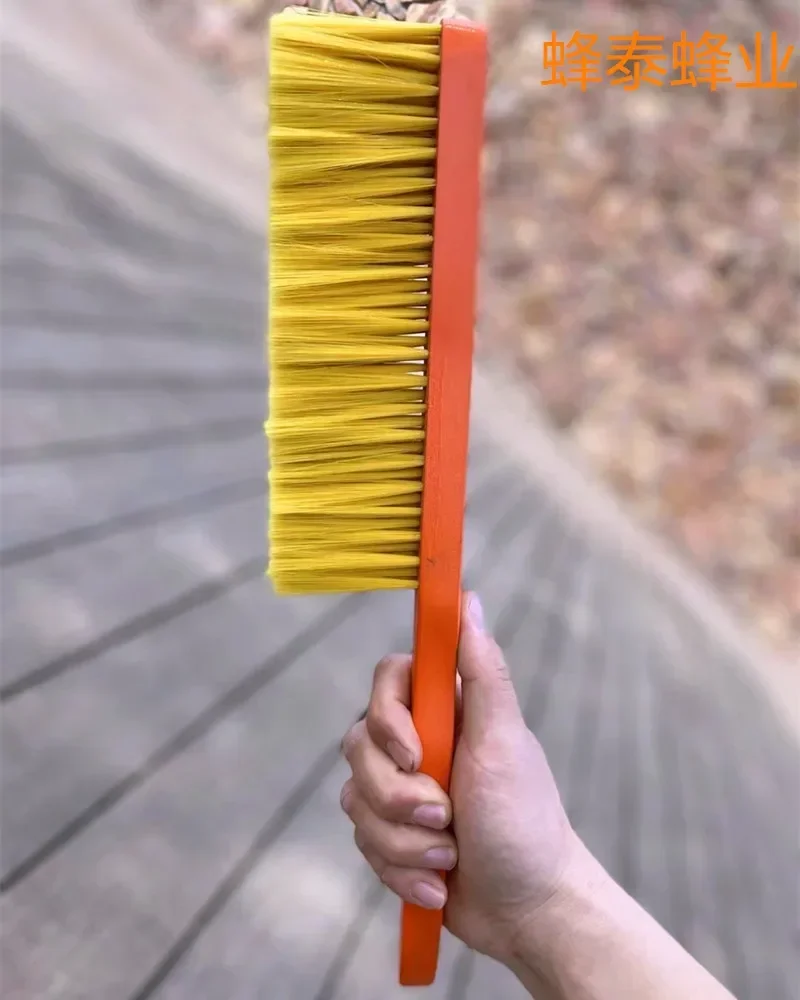 A 2PCS Red Paint Handle, Five Rows Of Yellow Plastic Wire Beeswabs, And Five Rows Of Beeswabs
