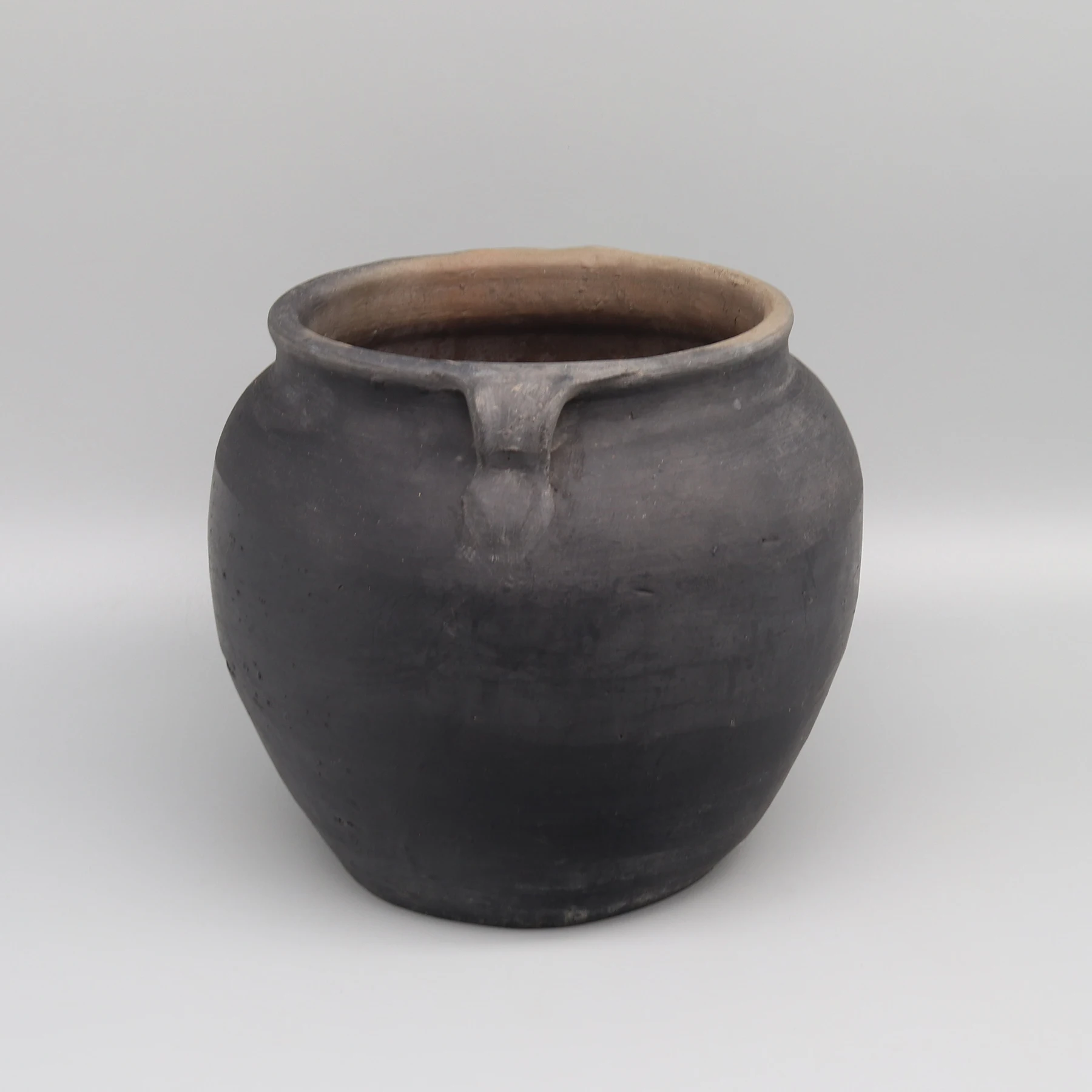 

Black pottery, old pot, flower vase, home decoration