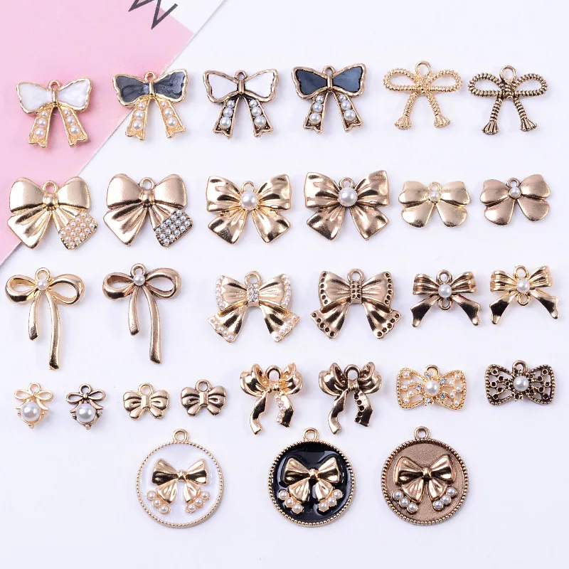 

100Pcs sets of new combined material bow pearl jewelry pendant DIY style combined hair accessories hair rope accessories