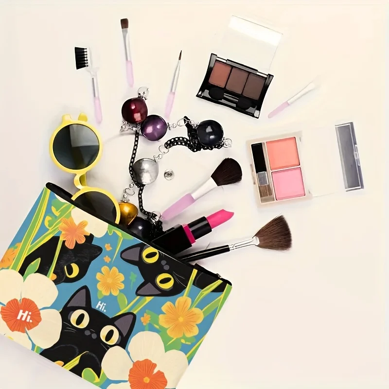 Urocza kosmetyczka z czarnym kotem i kwiatowym wzorem - wielofunkcyjna, pojemna, przenośna kosmetyczka.