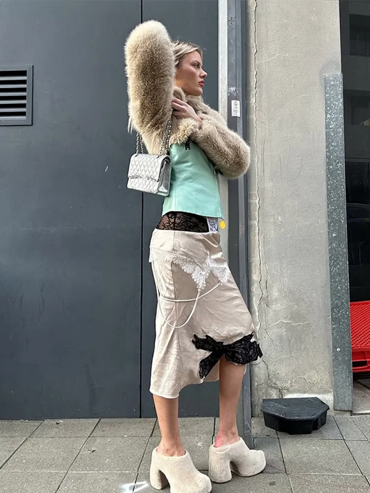 Mode recadrée fausse fourrure manteau femmes Chic solide revers manches longues mince veste courte 2025 hiver dame quotidien haute rue vêtements d'extérieur