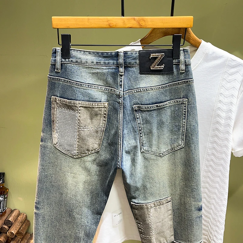 Streetwear men's straight Slim jeans spring and summer new trend broken holes patch retro distortion fashion splicing jeans