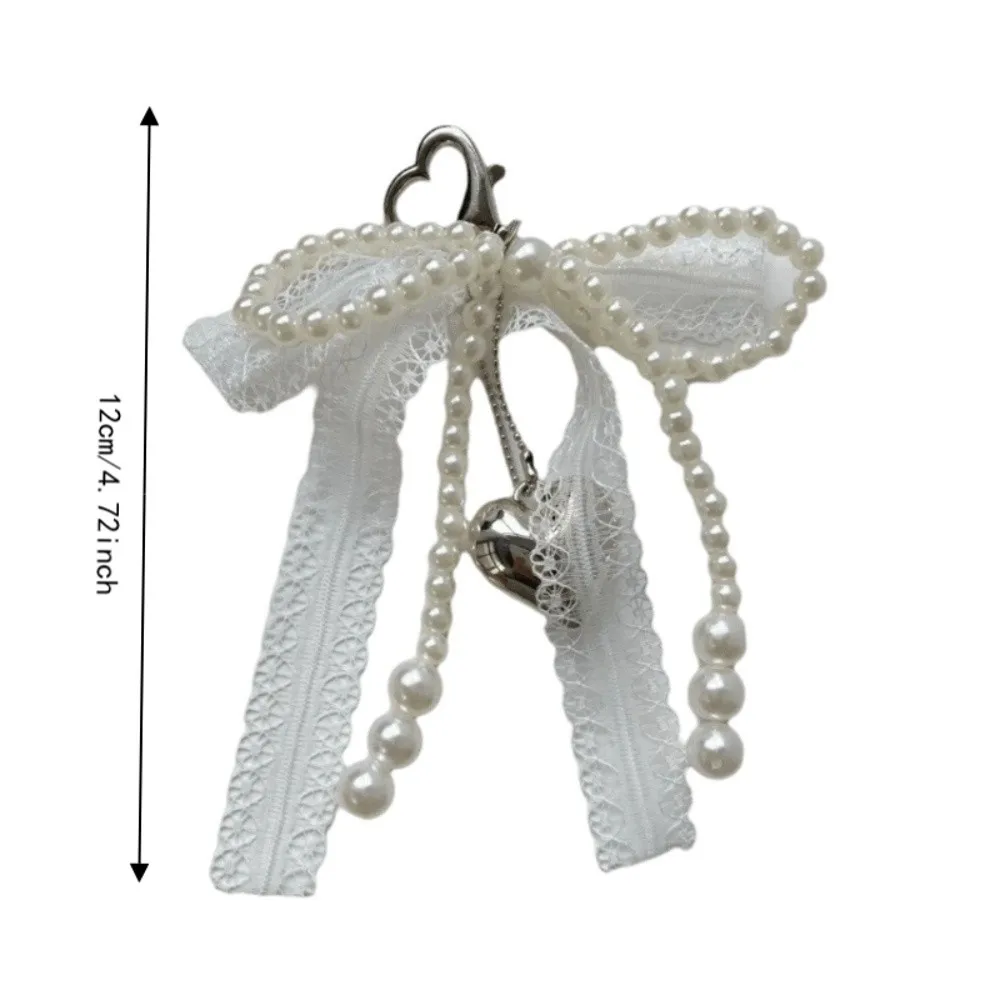 Einfacher Schleifenanhänger aus Legierung, Spitze, Kunststoffperle, Schlüsselanhänger, weiße geflochtene Kette, hängender Schlüsselring, Auto – Detail 1