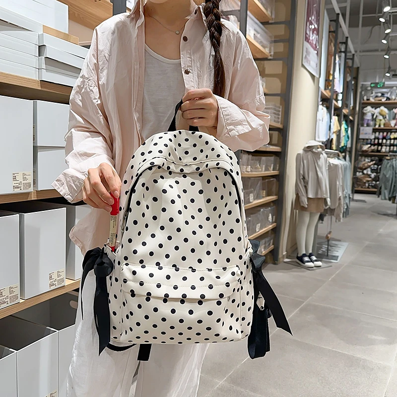 

Новые повседневные популярные нейлоновые рюкзаки большой вместимости в горошек для женщин, 2026, высококачественные портативные школьные сумки с милым бантом в стиле ретро