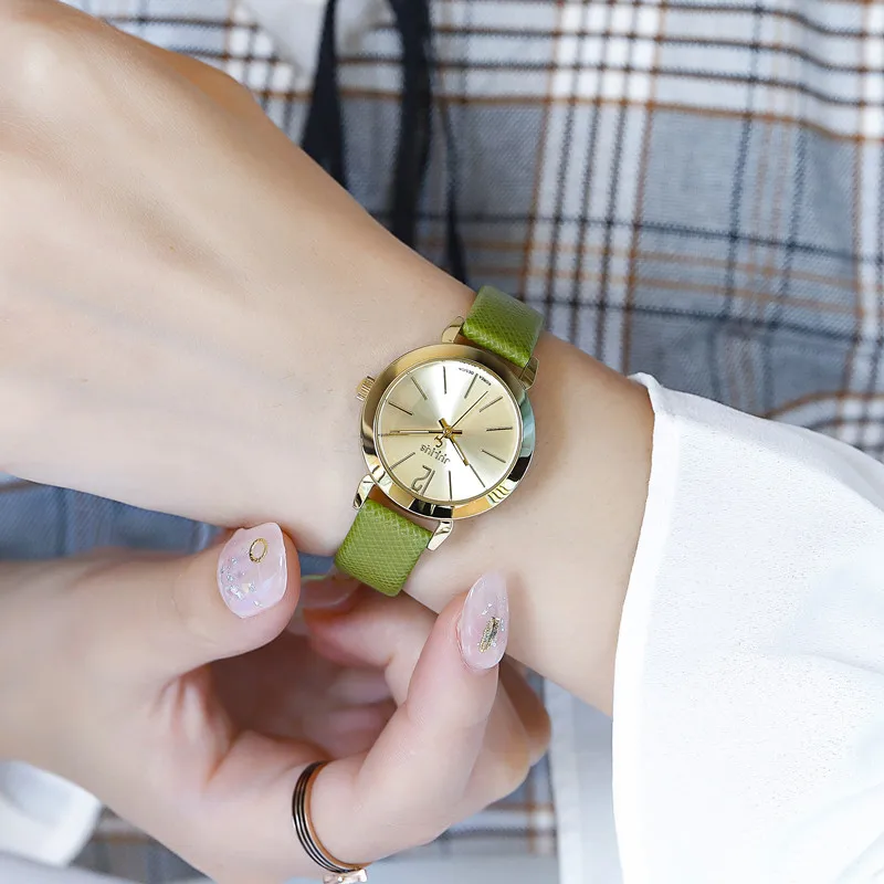 Elegant women's wristwatchminimalist style, green leather strap, fashion watch, Korean retro style, women's watch student watch.