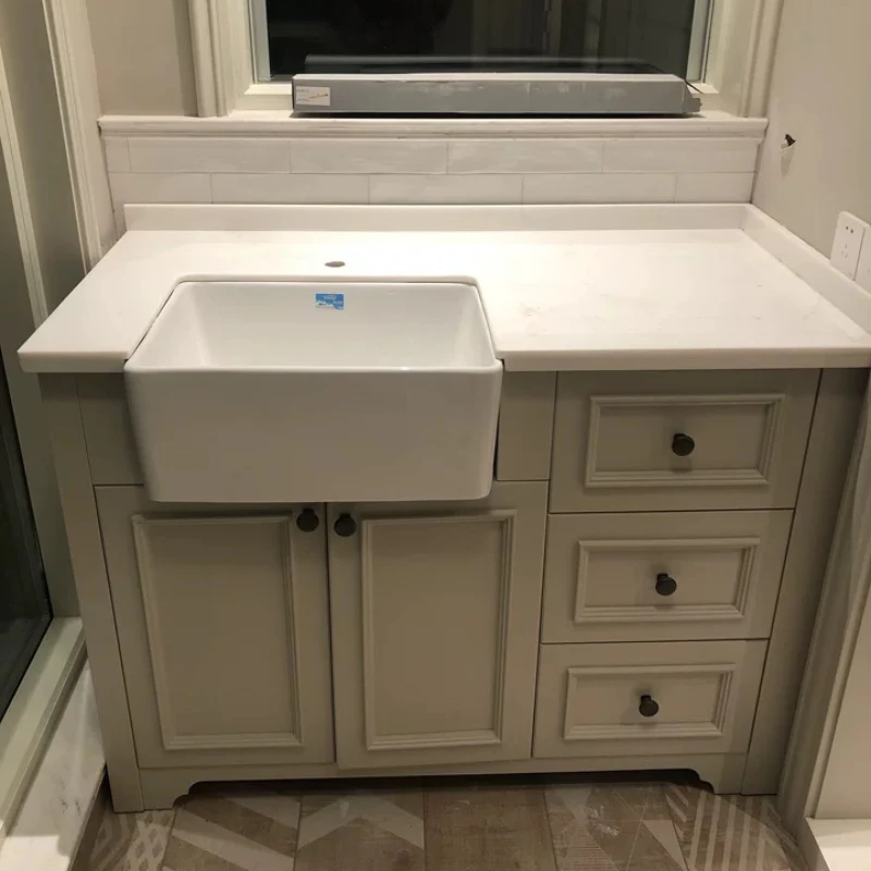 

Open kitchen sink with basin above the table is embedded in balcony with below to deepen washbasin and washcabinet partner.