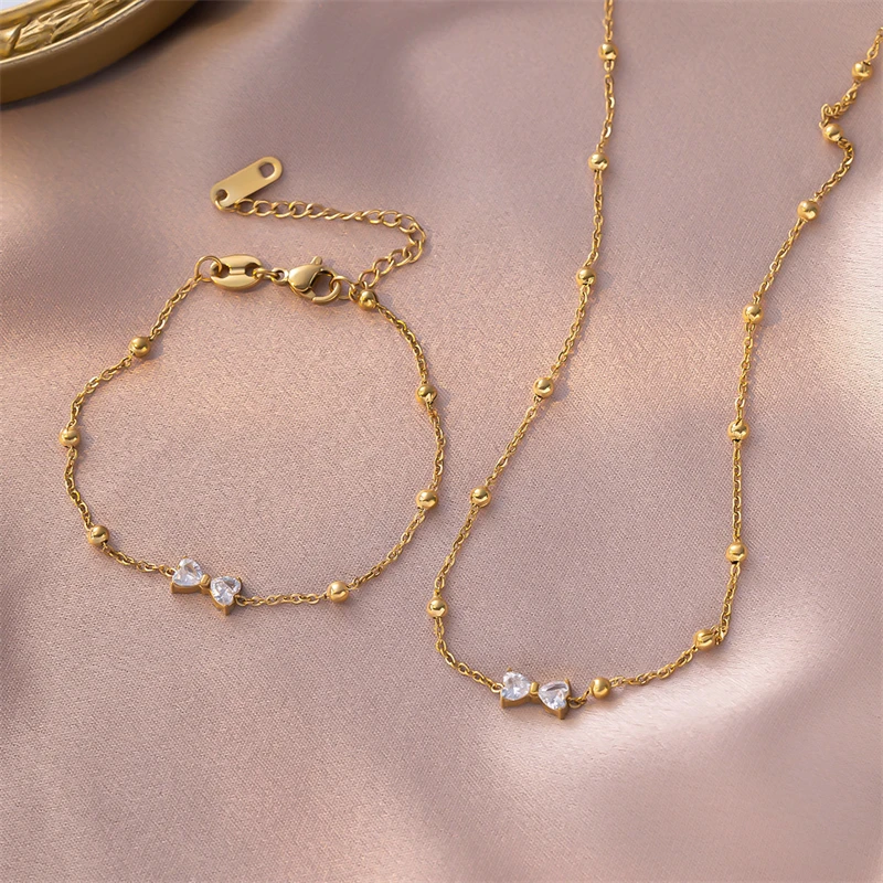 316L الفولاذ المقاوم للصدأ مجوهرات الأزياء الجديدة الفتيات الصغيرات على شكل قلب الزركون Bowknot سلسلة سحرية قلادة سوار القرط للنساء