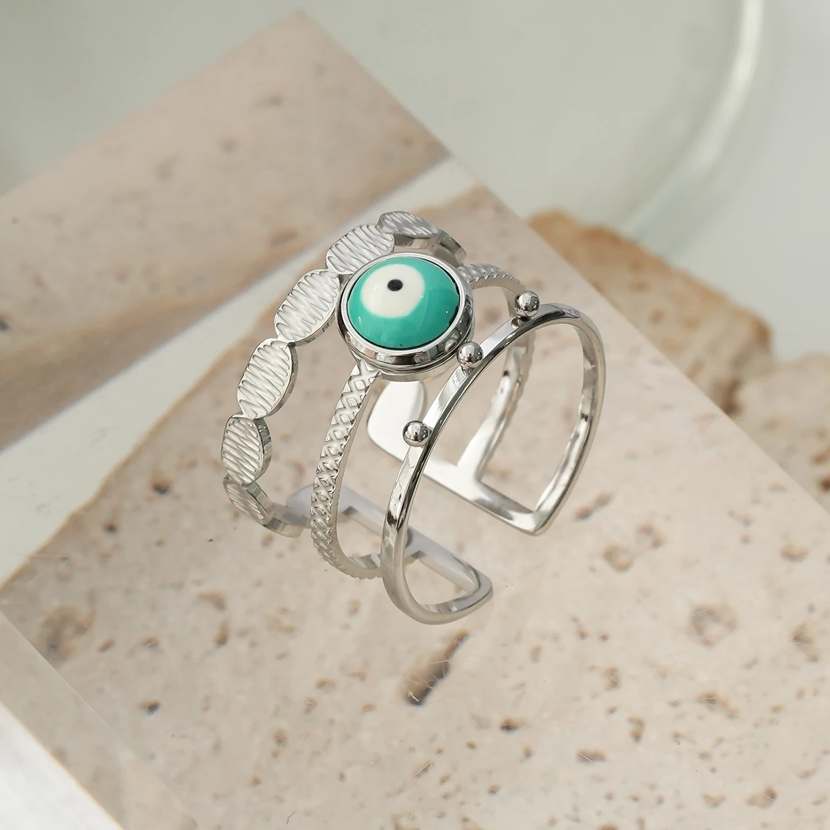 Personality trend demon eye design stainless steel earrings, retro fashion multi-layer hollow ring for women, color retaining