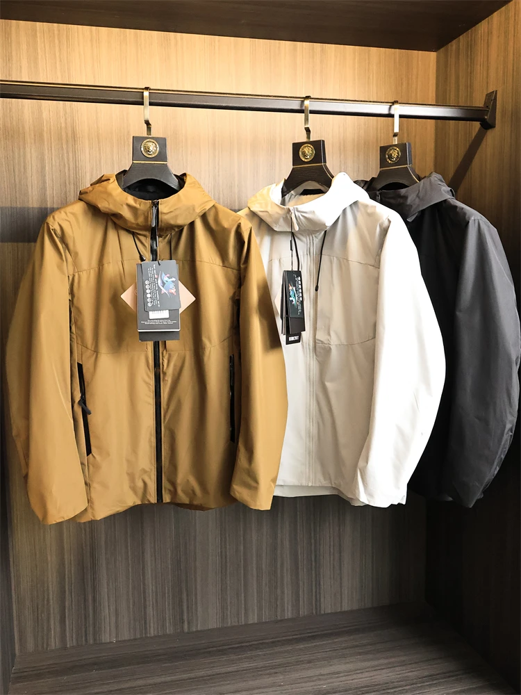 

Функциональная водонепроницаемая ткань Jaet для занятий спортом на открытом воздухе, мужская осенняя свободная посадка, длинное пальто с капюшоном и застежкой-молнией Faion Urba...