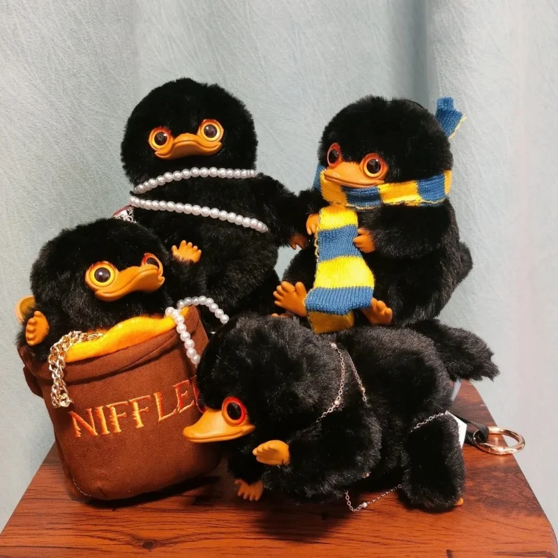 

В наличии: Оригинальный плюшевый брелок-сюрприз X11 «Гарри Поттер: Фантастические звери» — Ниффлёр. Коллекционная фигурка, модель, подарок.