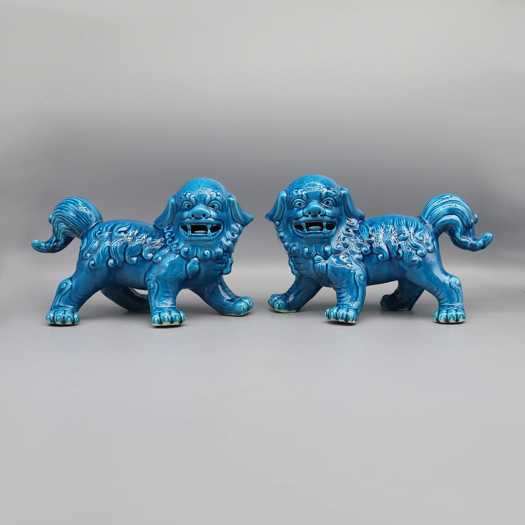 Walking lion statues, foo dogs, pair of guardian lions