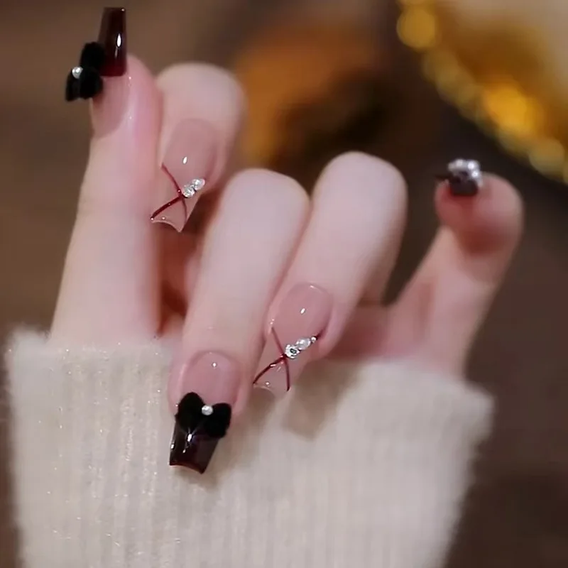 

24Pcs Long Square Press on Nails - Classic French Tip with Black Bow Patterns, Pearl Lines and Vintage Wine Red Base
