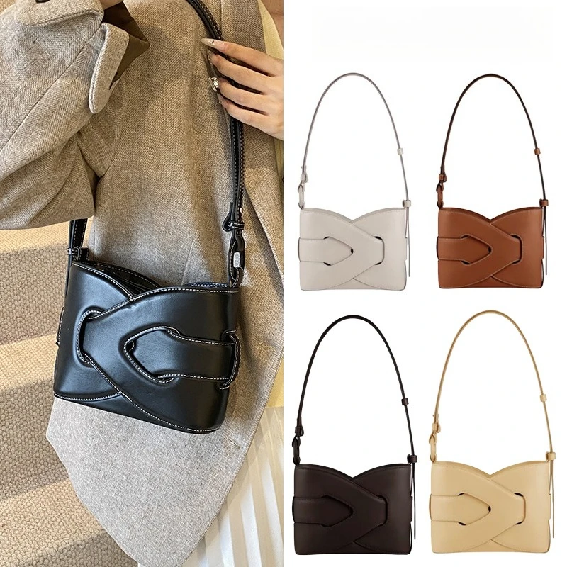 

New woven bag, French niche retro single shoulder twisted bag, hand-held crossbody bucket bag
