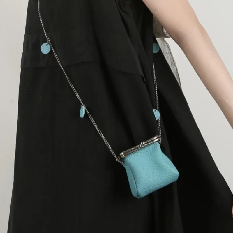 

Первый слой коровьей кожи, небольшая сумка для пеленания монет, модная мини-сумка для губной помады, сумка для хранения макарон, удобный нишевый дизайн