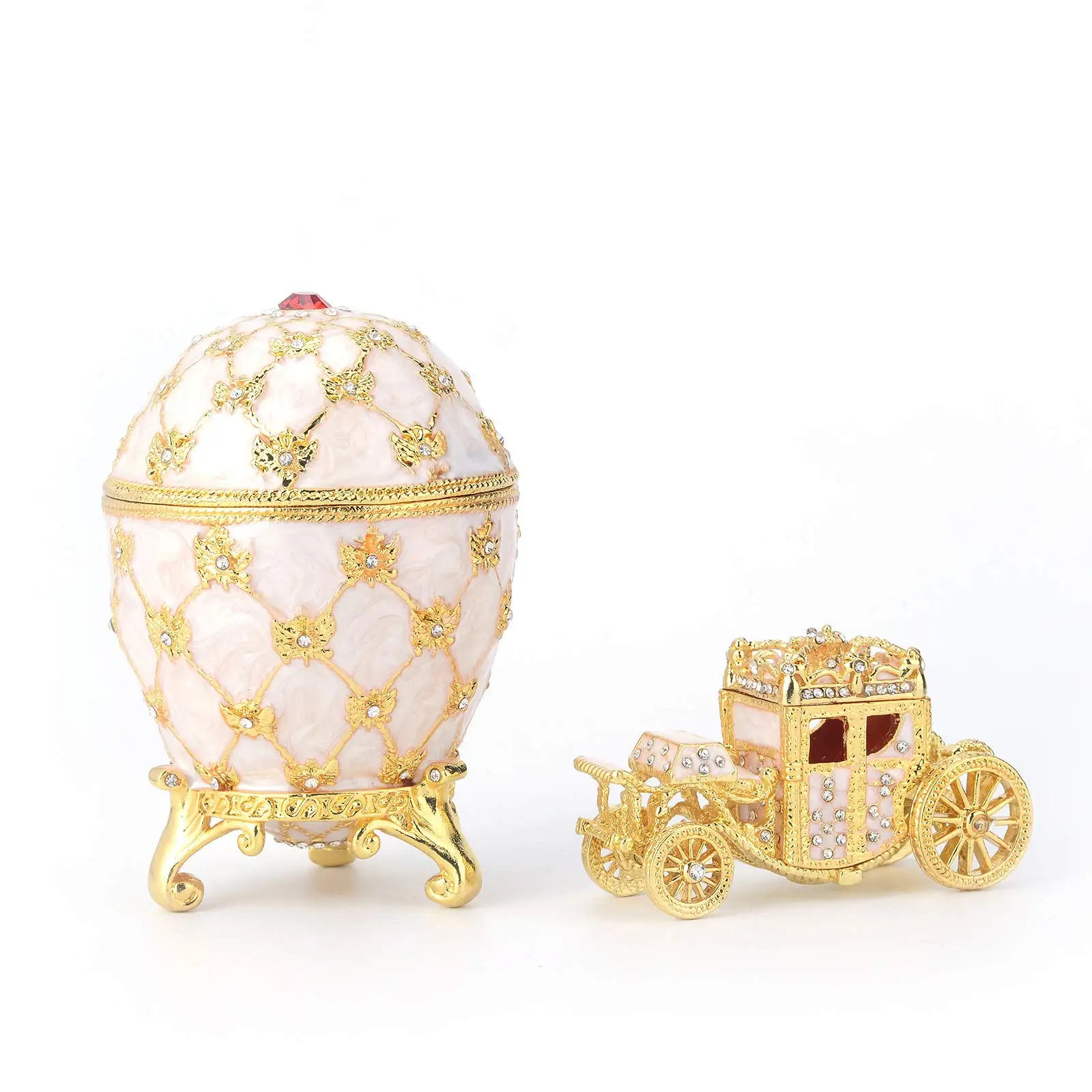 

Elegant Pink Enamel Egg-Shaped Jewelry Box With Golden Filigree And Miniature Royal Carriage Decorative Trinket For Collectors