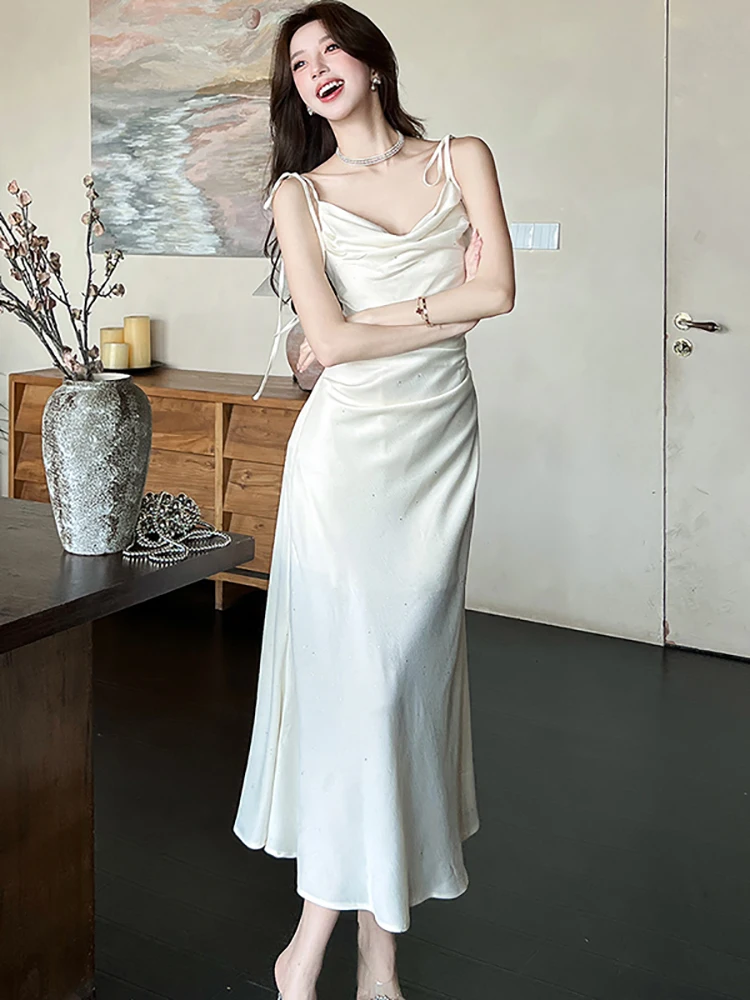 

2025 однотонное яркое шелковое шикарное сексуальное длинное платье на бретельках с бантом, женское корейское винтажное платье Хепберн, летнее элегантное облегающее вечернее платье