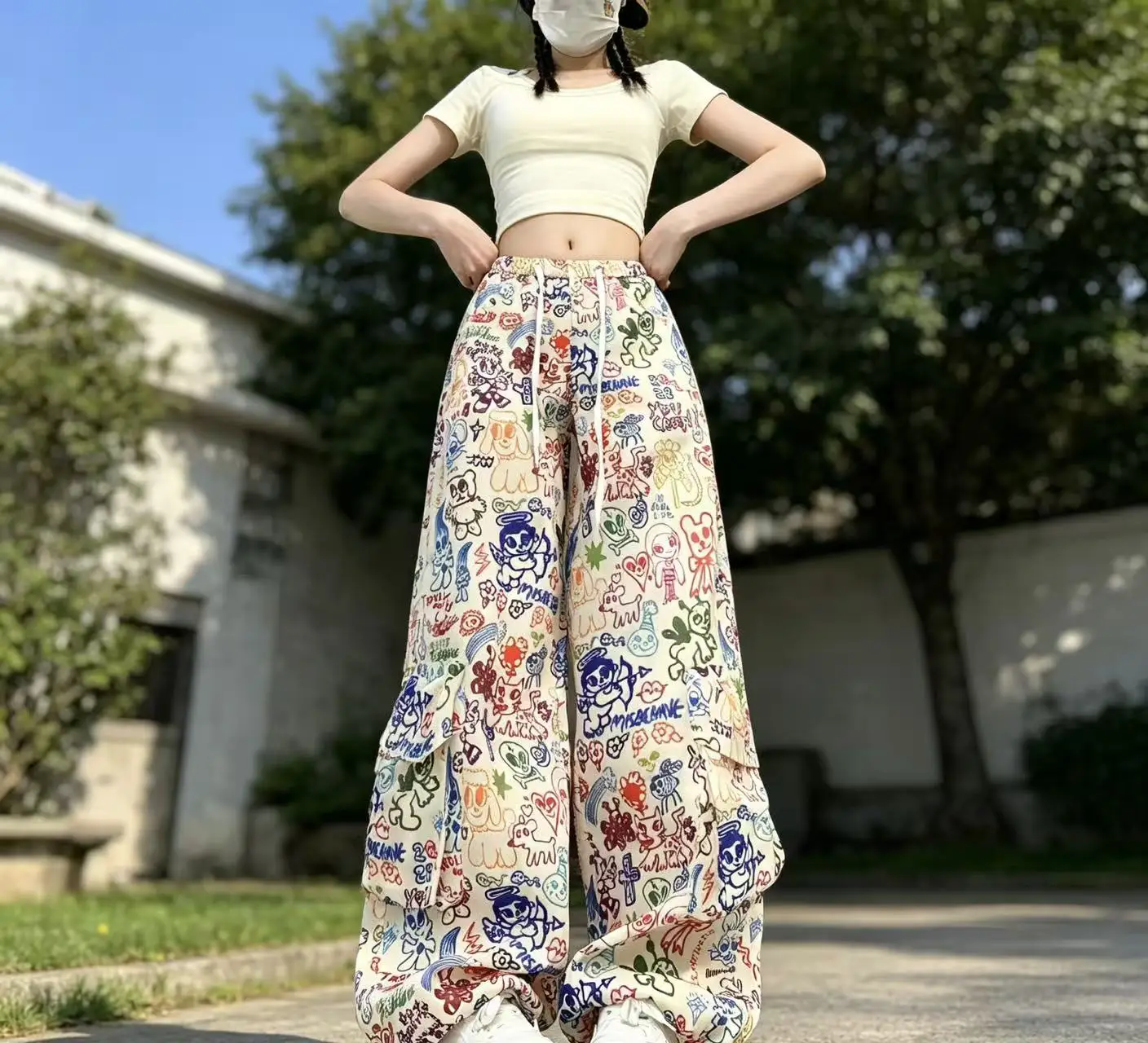 

Y2K Cartoon Graffiti Wide Leg Pants - Colorful Print Drawstring High Waist Loose Streetwear Trousers for Women