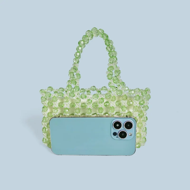 2025 صيف جديد الأخضر كريستال أكريليك اليدوية مطرز حقائب النساء العصرية عادية بلون اليد المنسوجة عطلة حقيبة حمل على الشاطئ حقيبة