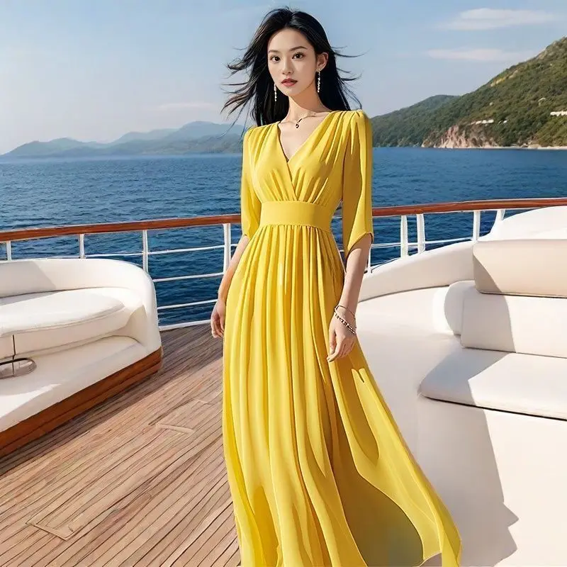 

French high-end yellow V-neck elegant dress, summer mid-sleeved temperament long seaside vacation big swing dress