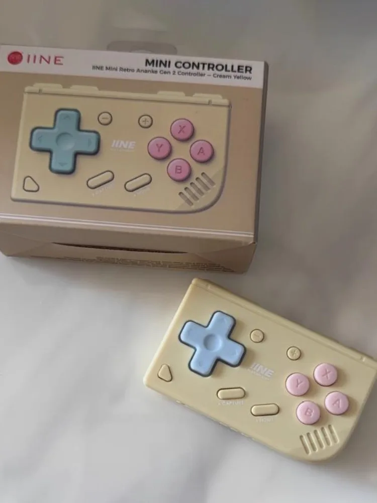 

Портативный контроллер INE Mini Gen 2 Retro PRO для Switch, раздельный контроллер для коротких видео, электронных книг, Bluetooth-перелистыватель страниц, геймпад