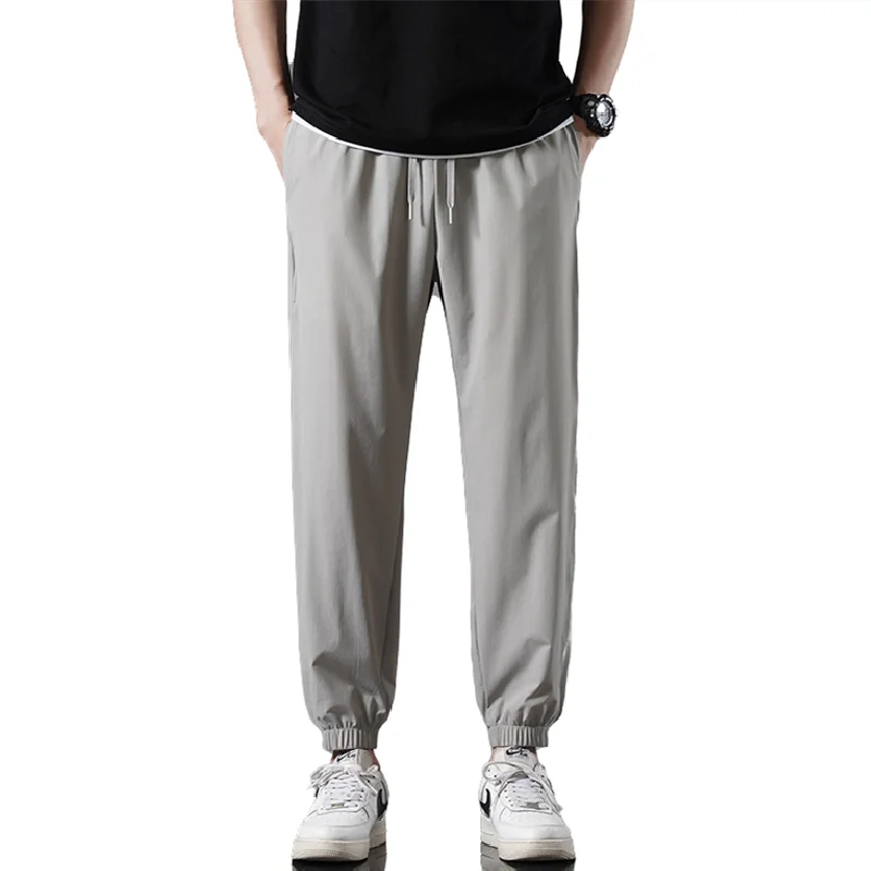 

Men's Ice Silk Pants New Spring Summer Fashion Solid color Nylon Blend Stretchy Ankle Length Cropped Trousers Casual Sports Wear
