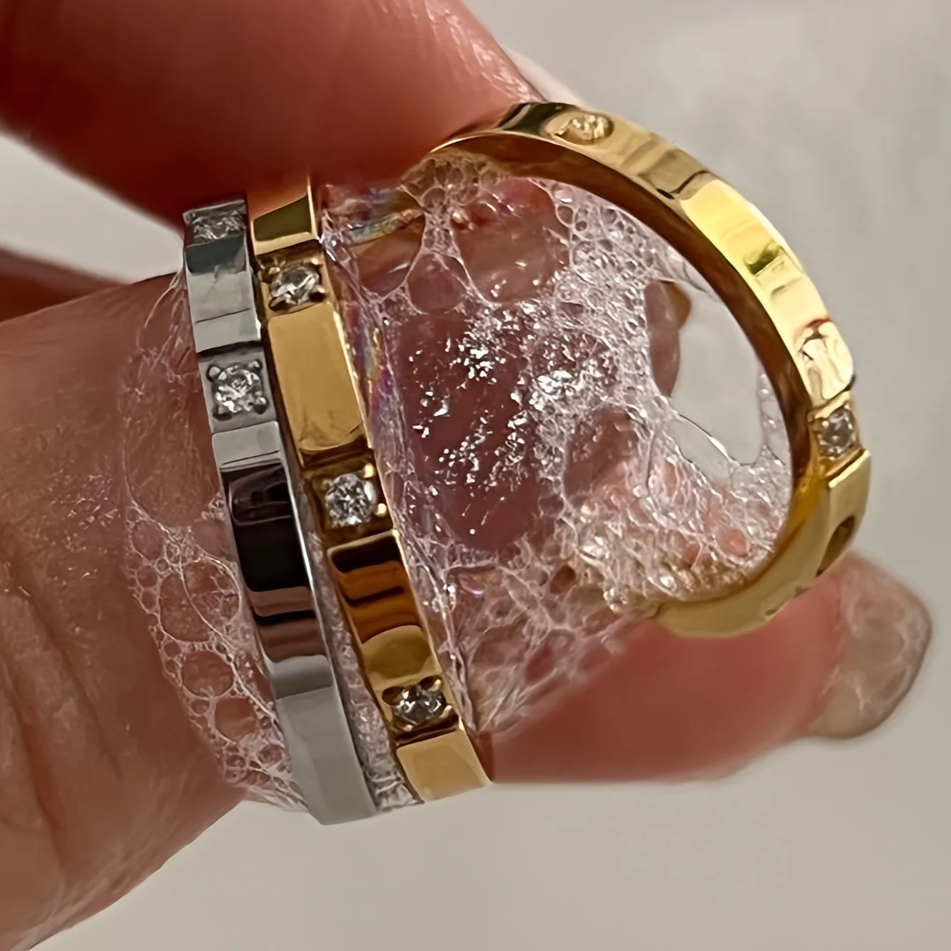 

A Stylish Women'S Ring with a Minimalist Design, Featuring Stainless Steel And Accents.