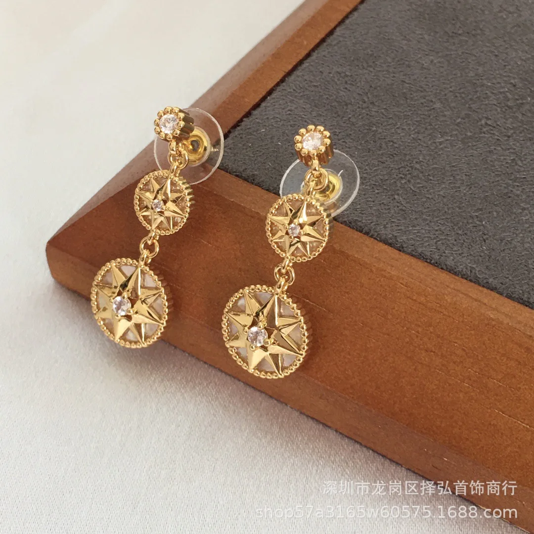 حار أزياء أوروبا القمر الأسود الذهب ستار أقراط المرأة سحر المجوهرات حزب المدرج العصرية