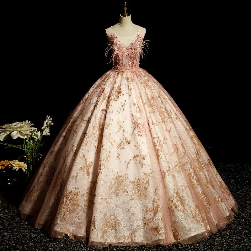 Nowe sukienki Vestidos Quinceanera z piórkiem klasyczna sukienka na imprezę elegancka suknia z prawdziwego zdjęcia luksusowe sukienka na studniówkę Robe De Bal