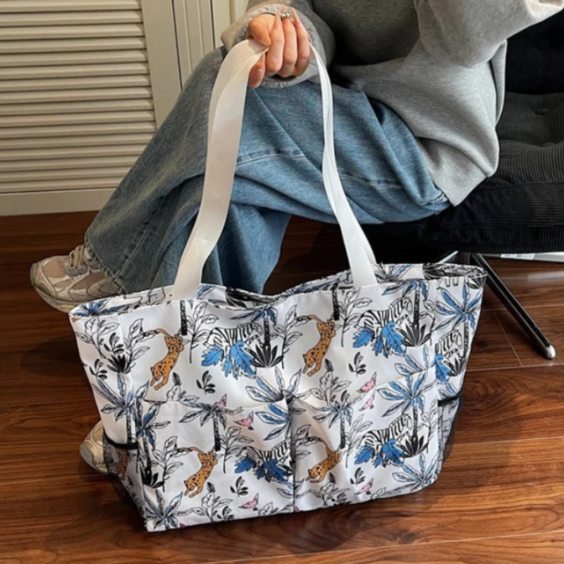 

Summer Flowers Large Capacity Nylon Shoulder Bags New Simple Soft Versatile Sweet Handbag 2026 Hot Sale Fashion Women's Bags