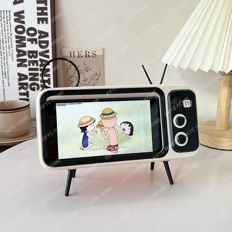 

Mobile phone holder retro small TV wireless bluetooth speaker ins wind lazy chasing drama artifact multi-function seat ring