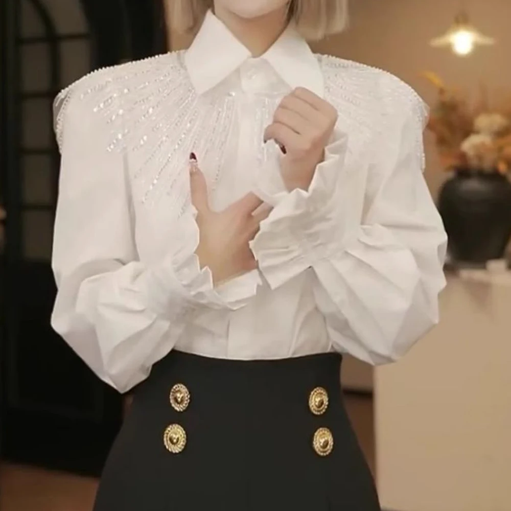 French design sense niche white lapel hot diamond shirt women's 2026 new temperament versatile age-reducing shirt