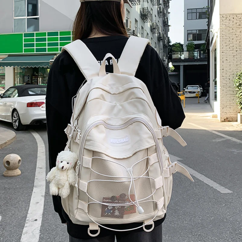 

Japanese College Backpack 2023 Students Aesthetic Schoolbags with Pendant Solid Color Girls Mochila Multi-Pocket Travel Rucksack