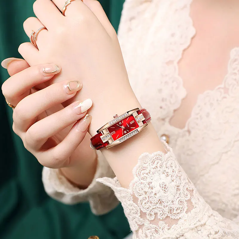 Luxury and trendy women's diamond studded watch with belt markings in peacock green, fashionable women's quartz watch