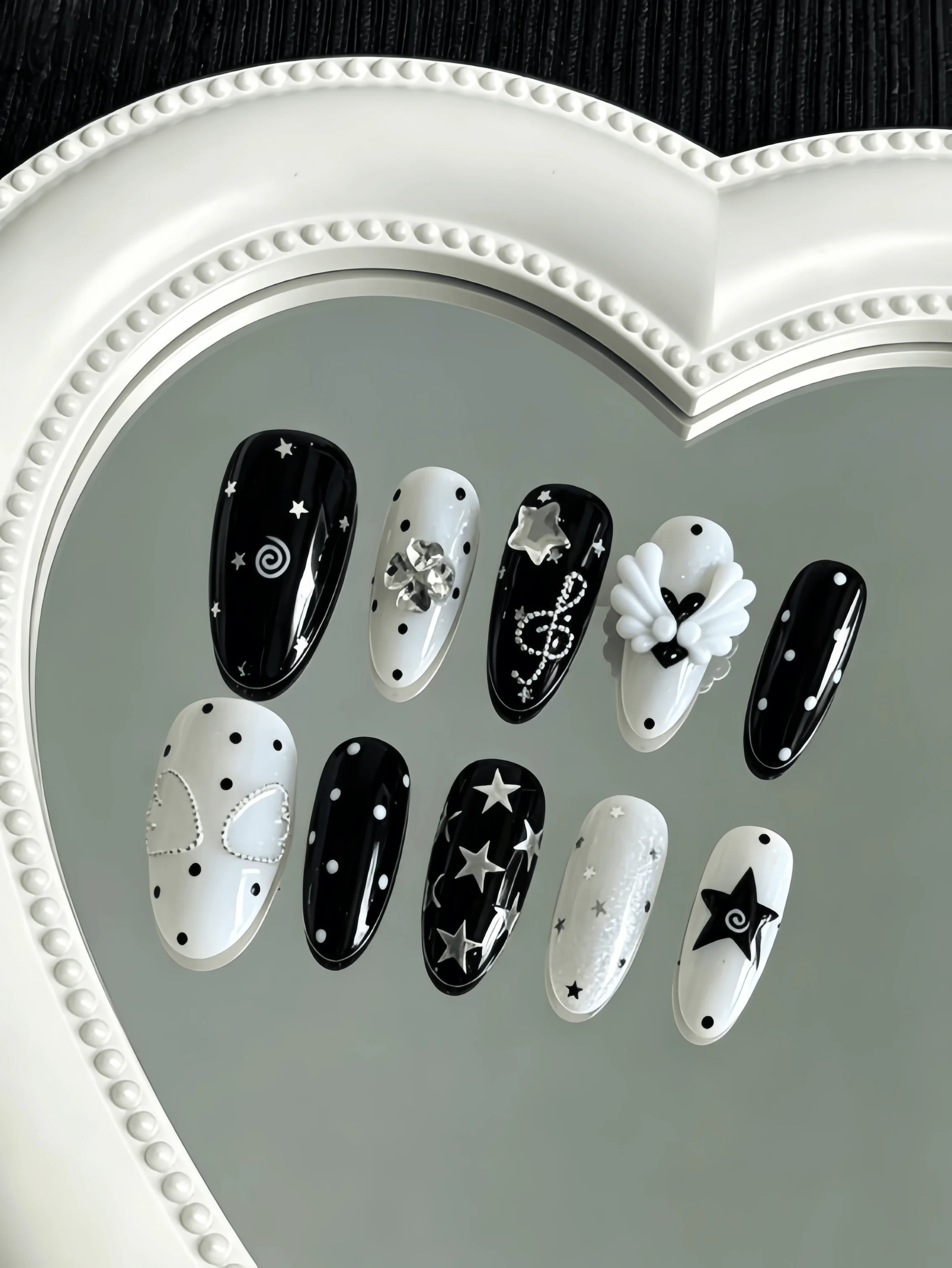 10 Pieces of Handmade Almond-Shaped Full-Cover Nail Tips, Medium Length, Black and White Classic Color Combination with Polka Dots, Five-Pointed Stars, Musical Notes, Rhinestones, and 3D Angel Wing Decorations, Y2K Sweet and Cool Style, Suitable for Women and Girls, Perfect for Summer Vacations, Graduation Season, and as a Gift, Comes with 1 Piece of Jelly Glue and 1 Nail File