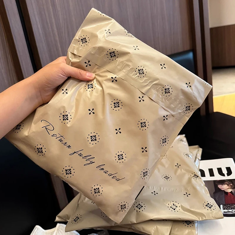Black Flower Printed Express Bag Milk Tea Color Plastic Shipping Mailing Bags Self Adhesive Gift Envelope Clothes Package 100Pcs