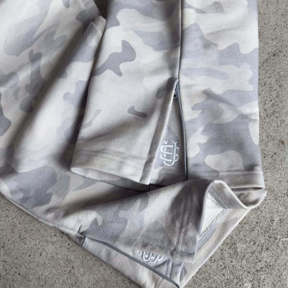 2025 hombres y mujeres high street hip-hop rap street Nueva cuerda elástica cremallera sudadera pantalones color sólido pantalones casuales