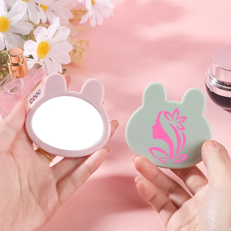 مرآة مكياج على شكل رأس أرنب مبتكرة لطيفة صغيرة محمولة باللون الوردي والأخضر والأبيض والأسود