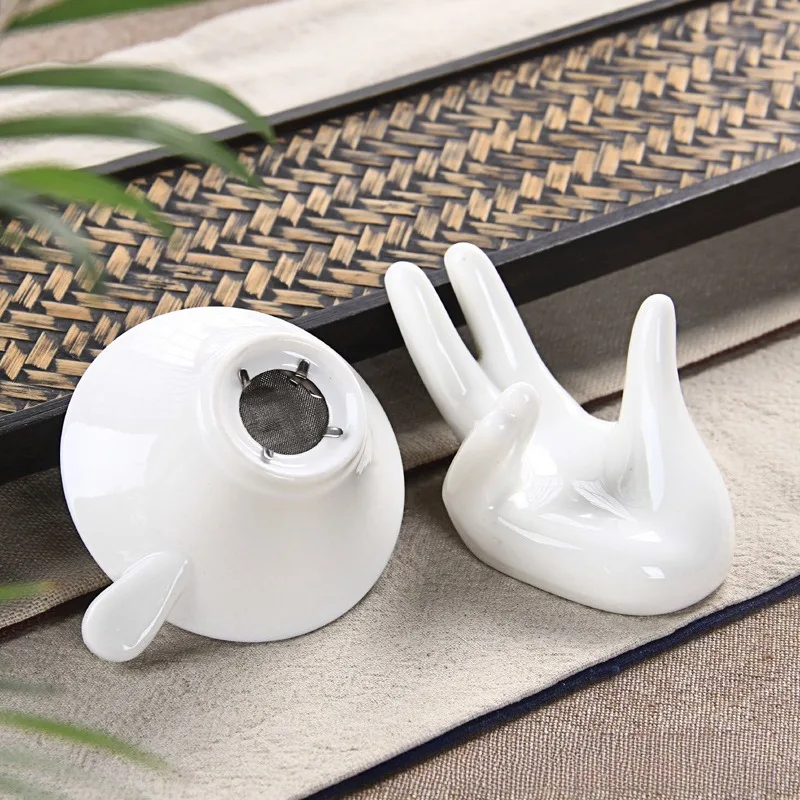 

White porcelain tea strainer, ceramic creative tea filter, hand holder, egg holder, business card holder, tea filter accessories