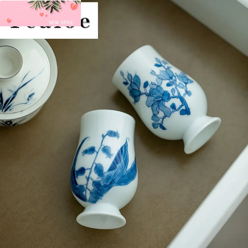 

2pc/Set Pure Hand-painted Convallaria Majalis Ceramic Tea Cup Phoenix High Foot Smell Cup Portable Kung Fu Tea Master Cup 70ml
