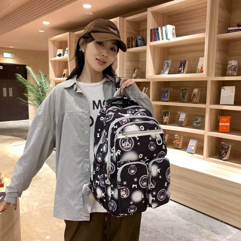 Sanrio Kuromi Simple Cute Fashion Student and Child Large Capacity Stress Relief Travel Bag Anime Nylon Canvas School Bags Woman