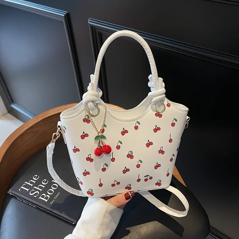

Новая модная женская сумка, сумка-тоут с вишневым принтом, нишевая текстурированная сумка через плечо с принтом, сумка-багет.