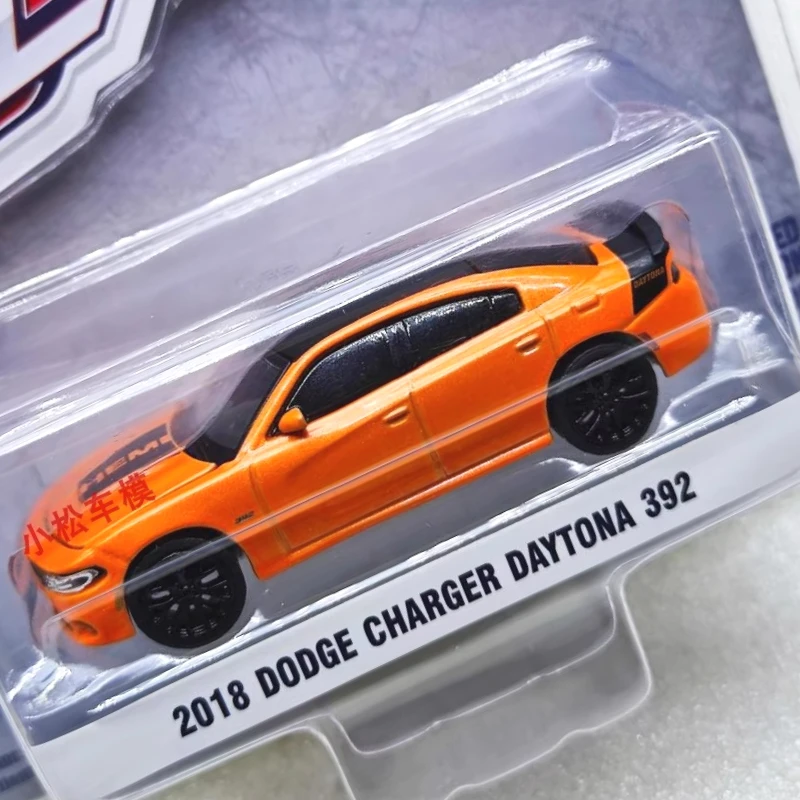 

Green Light 1:64 Muscle Series 29 - 2018 War Horse Daytona 392 - Go Mango Model Limited Edition Collectible Wall Pendant Gift