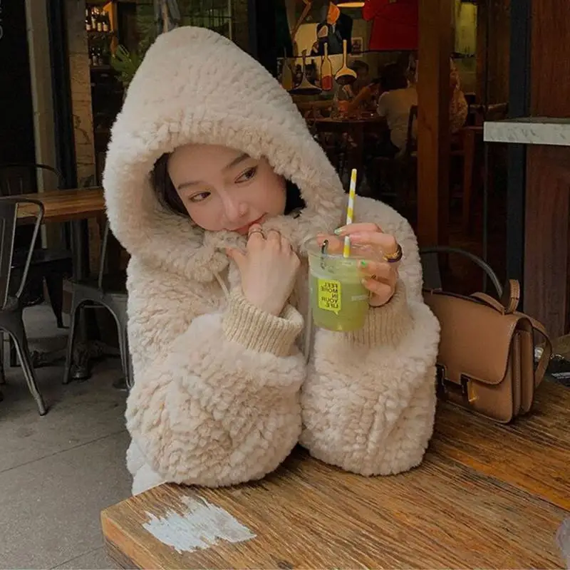 In 2022, The New Imitation Rex Rabbit Fur Coat for Women Winter Short Lamb Plush Loose Hooded Mao Mao Coat.