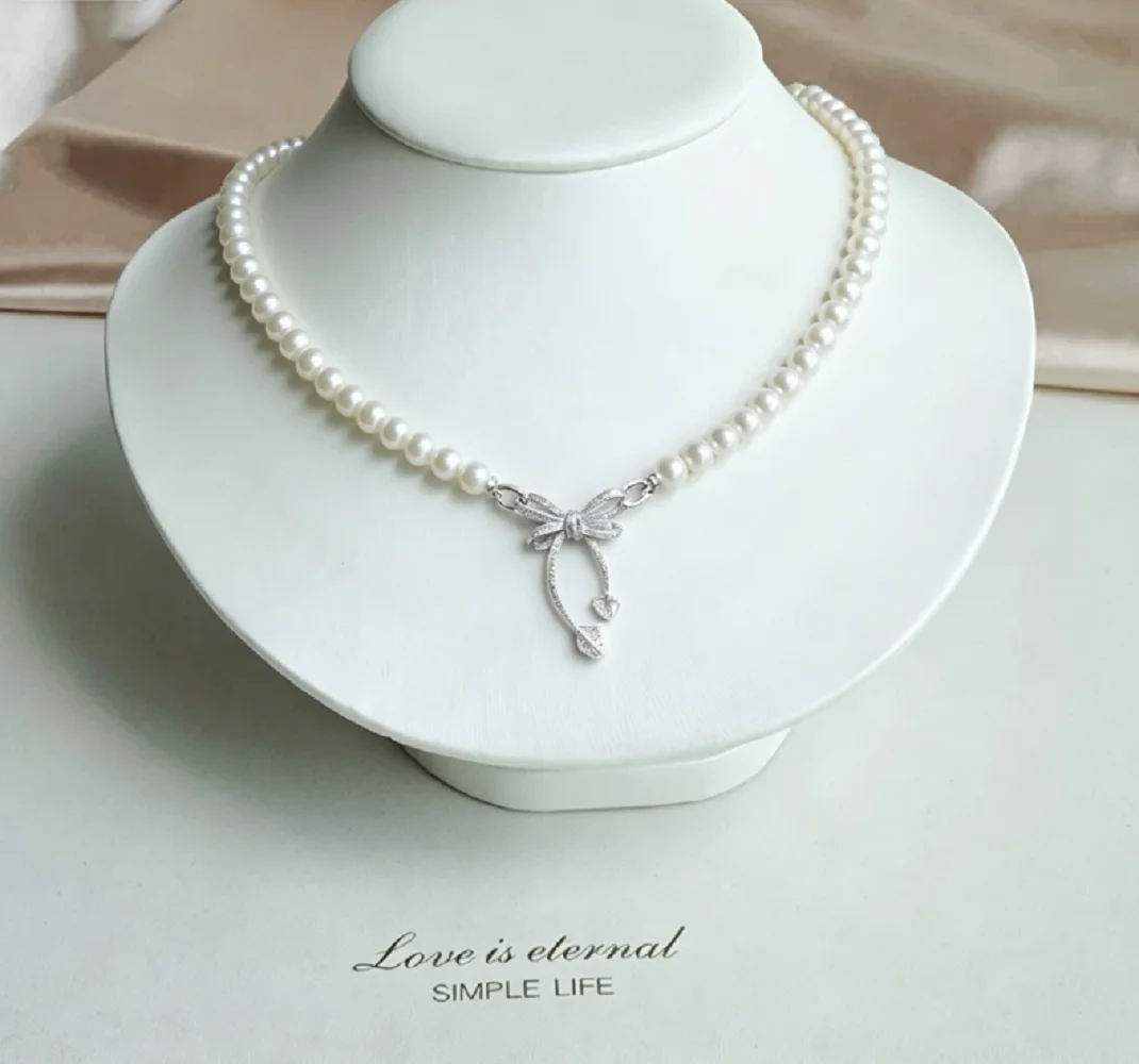 and elegant/necklace AAAA7-8mm/8-9mm natural  white pearl necklace18 in  butterfly clasp, can be used as a brooch