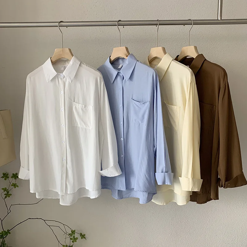 

In the spring of 2023 new womens pockets single-breasted pure color long shirt in long sleeve blouse