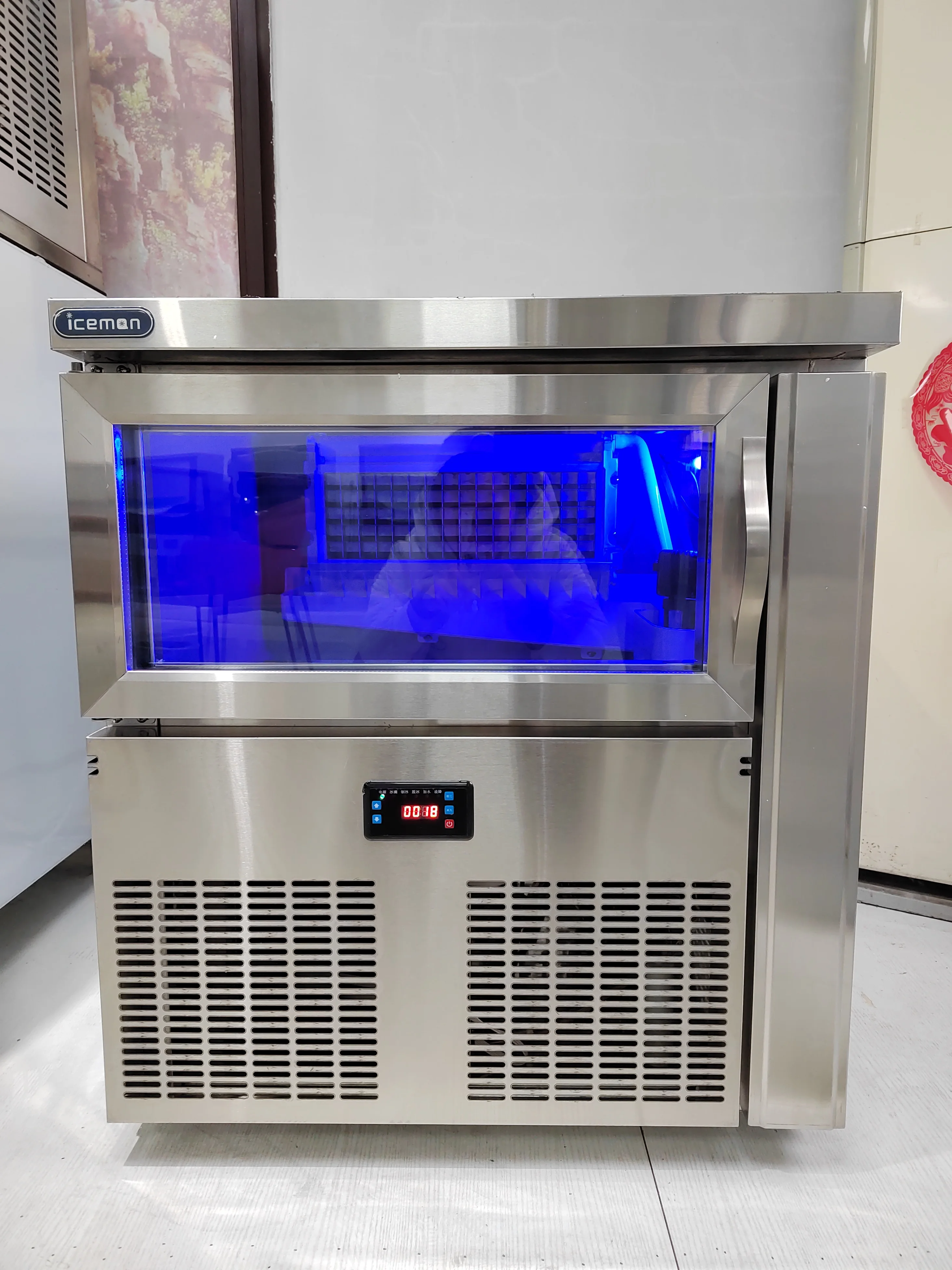 เครื่องทำน้ำแข็งอัตโนมัติ ICM-120P สำหรับธุรกิจ ขนาด 65 กก. คุณภาพสูง พร้อมไฟสีฟ้า ราคาโรงงานถูก เหมาะสำหรับโรงแรม/ร้านกาแฟ