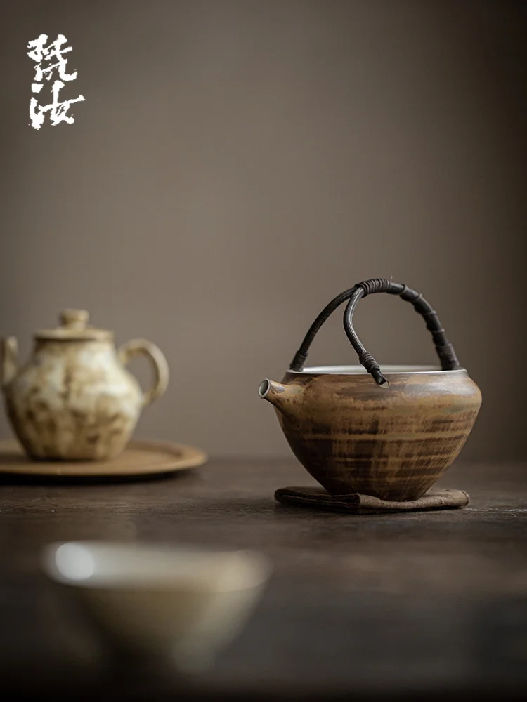 

2025 new Fanru rattan weaving lifting beam tea bowl coarse pottery fair cup ceramic kung fu tea set tea dispenser