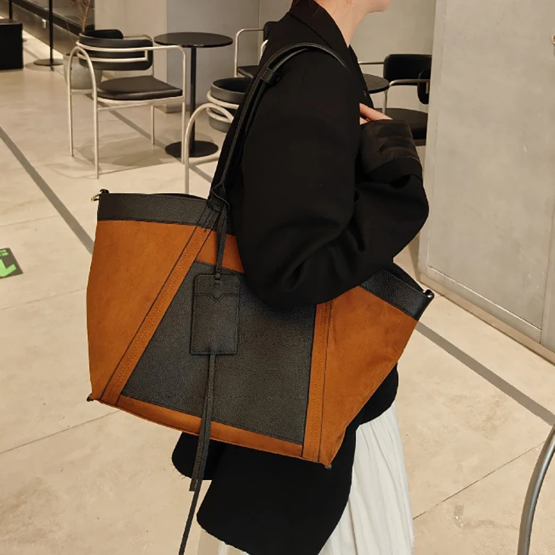

Top layer cowhide double-sided tote bag 2025 new niche design large capacity commuter underarm bag fashion ladies shoulder bag