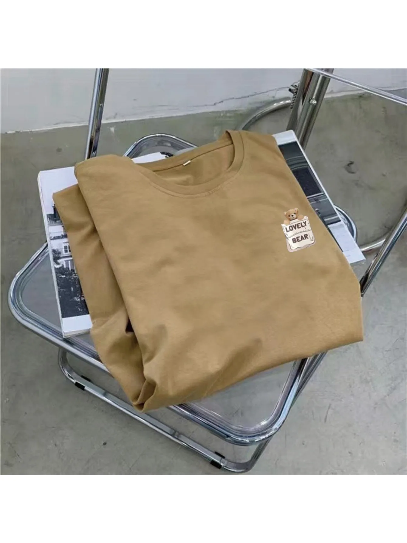 เสื้อยืดแขนสั้นกระโปรงผู้หญิงในฤดูร้อนขนาดใหญ่กระโปรงหลวมความยาวกลางลำลองชุดผ่าเหนือเข่า